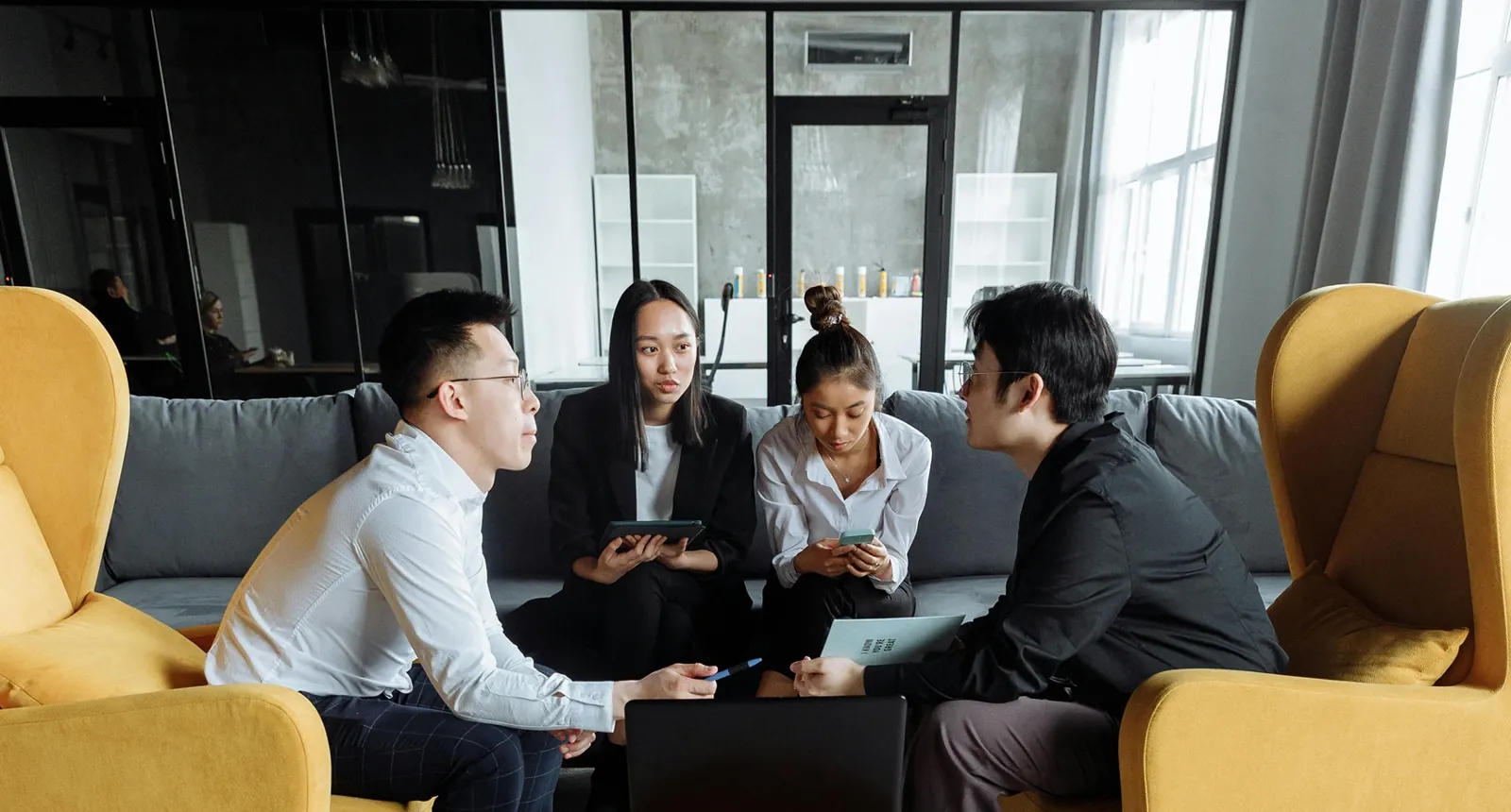 eZee Malaysia team collaborating in the office